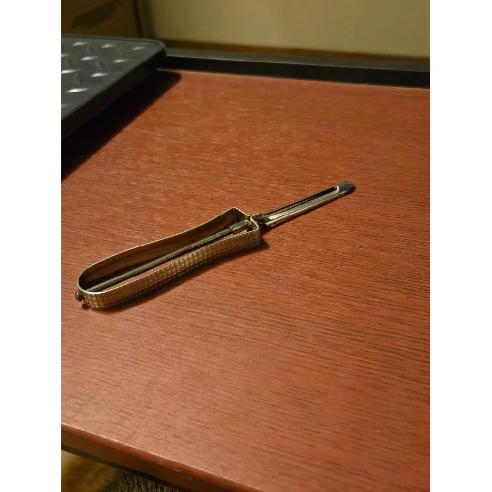 Vintage Metal Swivel Blade Potato Peeler Textured Handle Silver Tone